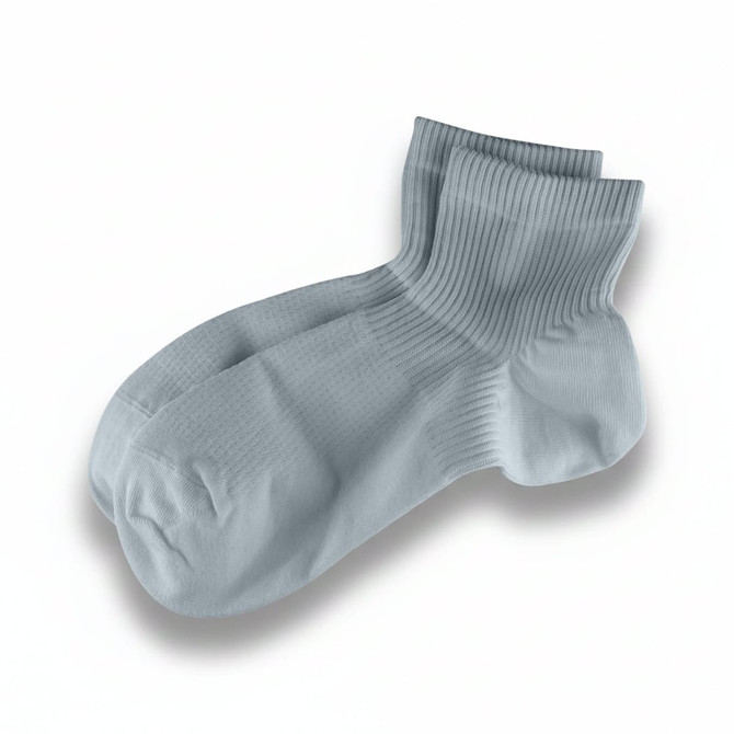 Light blue socks with a ribbed texture, featuring a logo on one side.