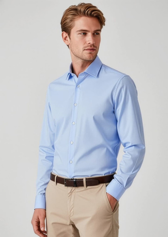 A slim fit long sleeve shirt in light blue, featuring a button-up design and a logo on the chest.