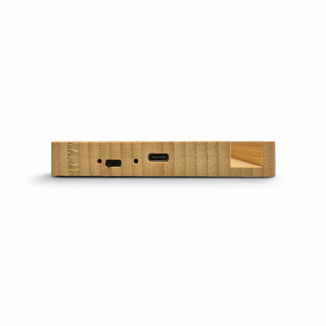 A wooden cup warmer with inductive charger ports, featuring a sleek, natural finish.