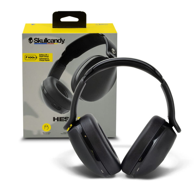 Black Skullcandy Hesh 360 headphones displayed next to their packaging. The box features a logo and handle for easy carrying.