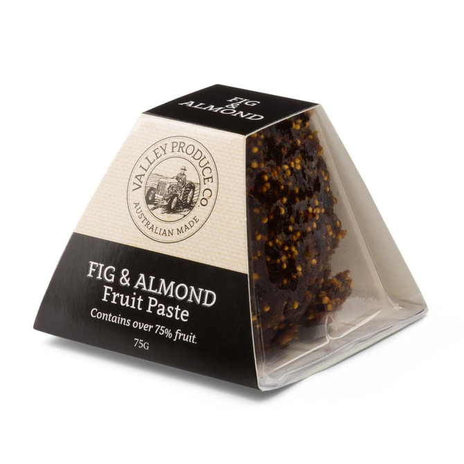 A triangular package of fig and almond fruit paste, featuring a dark brown and cream design, with a logo.