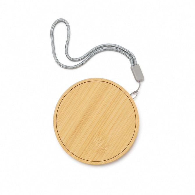 A round wireless charger set with a bamboo surface and a grey strap for easy carrying.