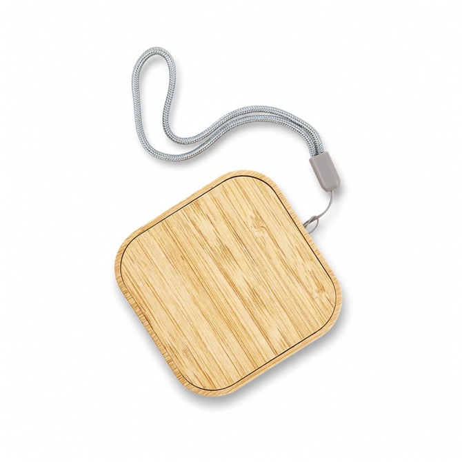 A square wireless charger with a bamboo finish and a grey cord. It features a logo on its surface.