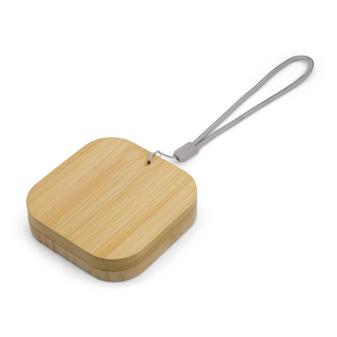 A square bamboo wireless charger with a grey strap for easy carrying. Features a simple design and natural finish.
