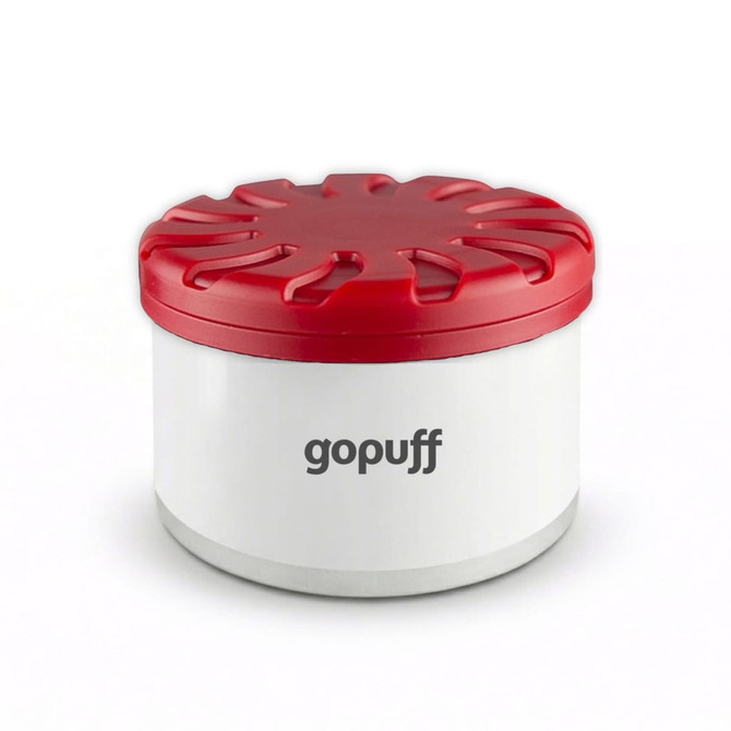 A round air freshener container with a red lid and white base, featuring a logo.