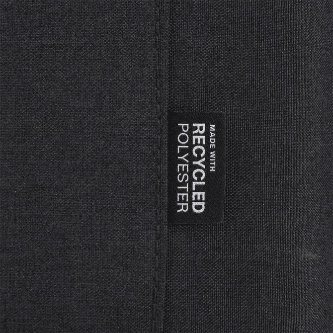 A black fabric label featuring the text "Made with Recycled Polyester." The label is sewn into the material.