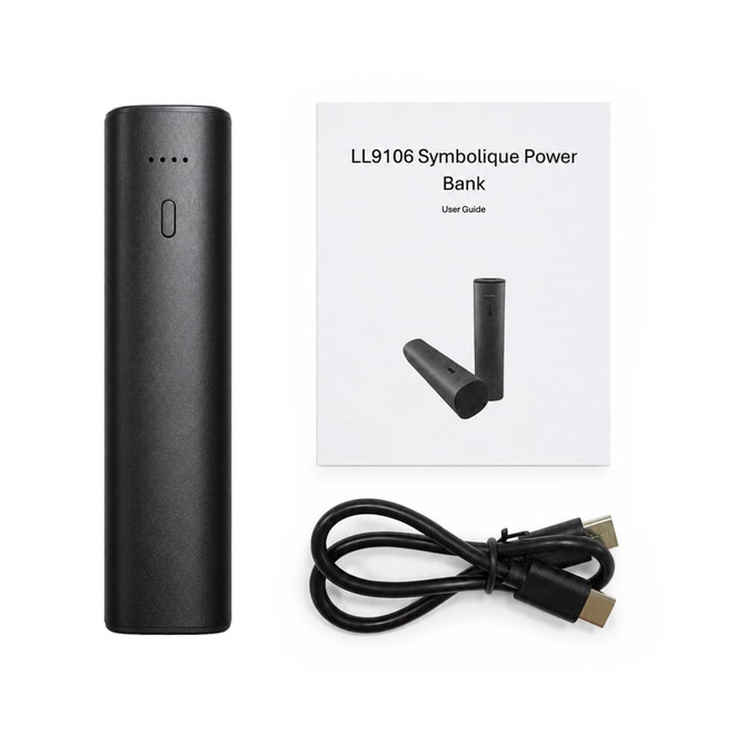 A black cylindrical power bank with a user guide and a USB cable. The power bank features an indicator light.