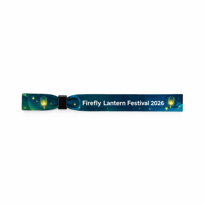 A vibrant blue wristband featuring lantern designs, with a logo and text for the Firefly Lantern Festival 2026.