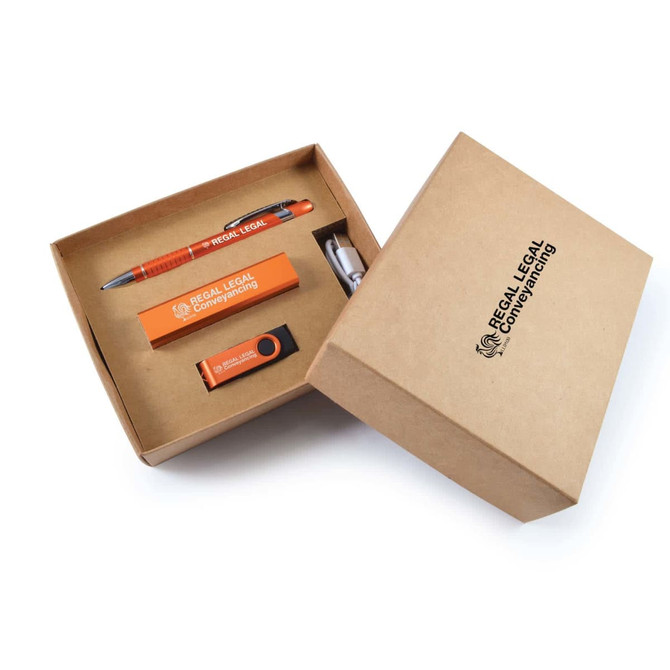 A cardboard gift box in brown, featuring an orange pen, USB drive, and a small item, all with branding.