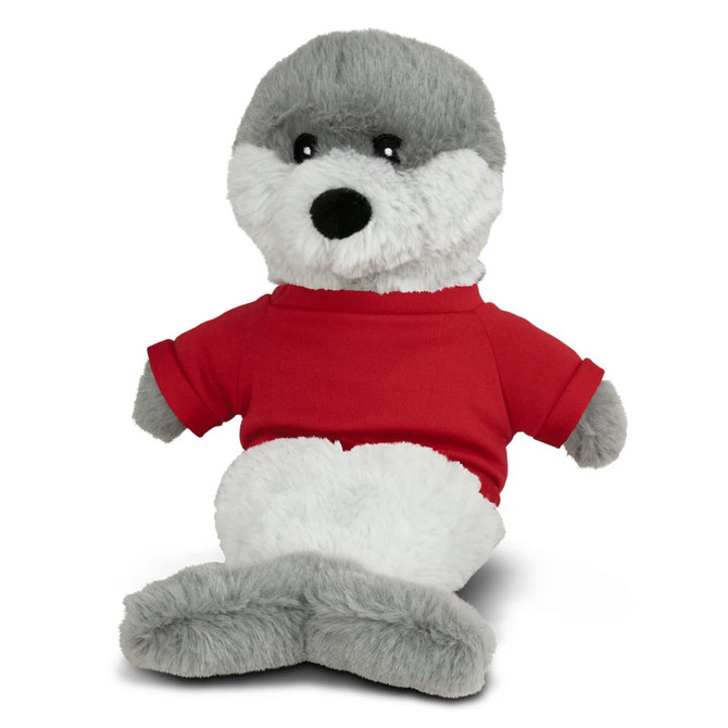 A grey and white seal plush toy wearing a red shirt, sitting upright with a friendly expression.