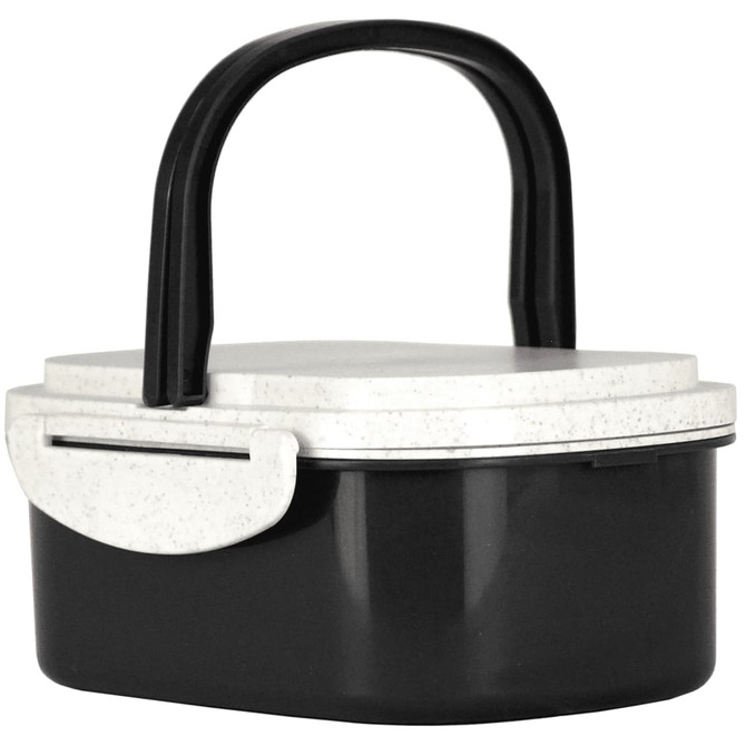 A plastic and wheat straw lunch box in black and white with a handle and a secure lid. It features a logo.