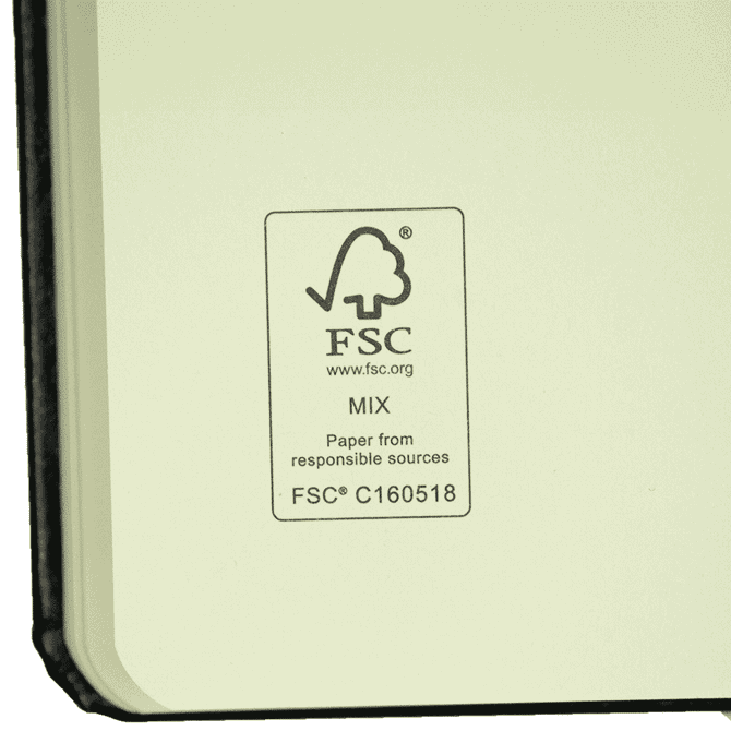 A bound journal with a black cover and cream-coloured pages, featuring an FSC certification logo.
