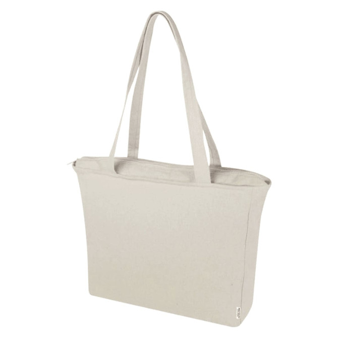 A light beige recycled zip tote bag with long handles and a zip closure. Features a logo on the side.