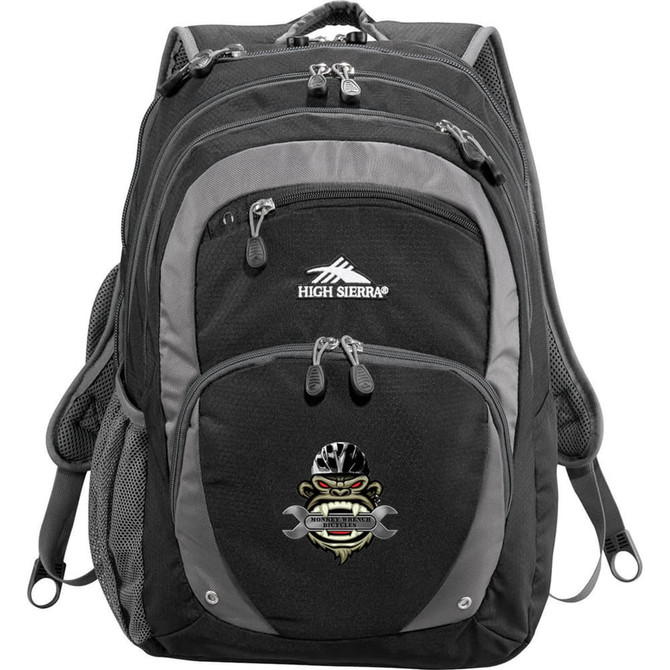 A black and grey High Sierra Overtime Fly-By 17" backpack with multiple compartments and a logo on the front.