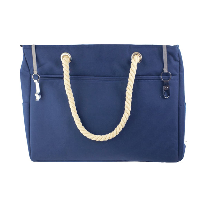 Navy waterproof beach bag with a rope handle and silver clasps, featuring two external pockets.