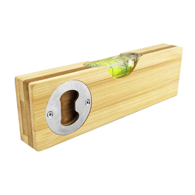 A drink bottle opener and leveller made of bamboo with a metal opening, featuring a spirit level.