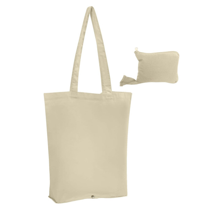 A beige foldable calico tote bag with long handles, accompanied by a small, compact storage pouch.