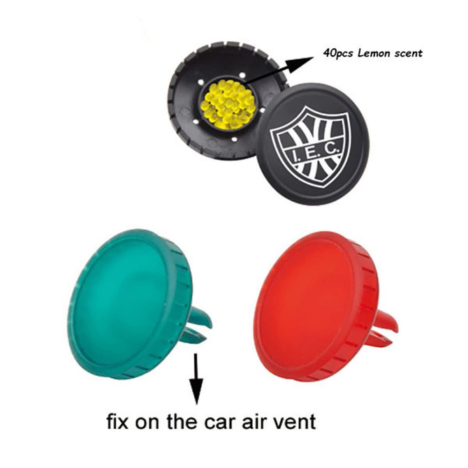 A car air freshener in green and red, featuring a logo, with 40 pieces in a lemon scent.