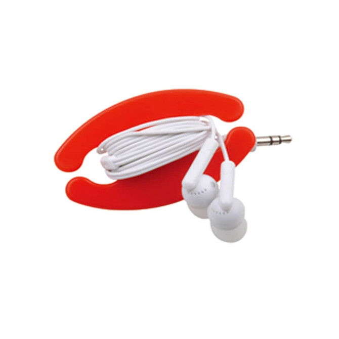 A red cable organiser holds white earphones neatly coiled, featuring a 3.5mm audio jack at one end.