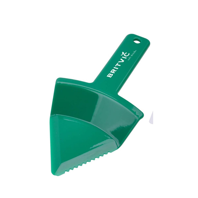 A green cake cutter with a serrated edge and a handle, featuring a logo.