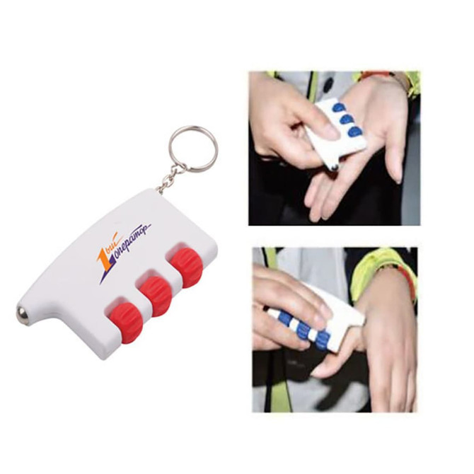 A health massager in white and red, featuring three blue buttons, attached to a keyring for easy carrying.