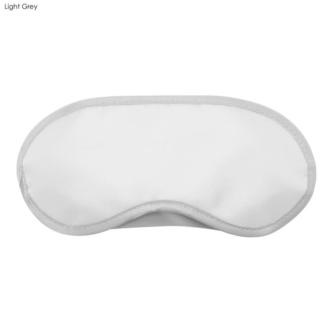 A light grey sleep eye mask with a soft design. It features a logo.