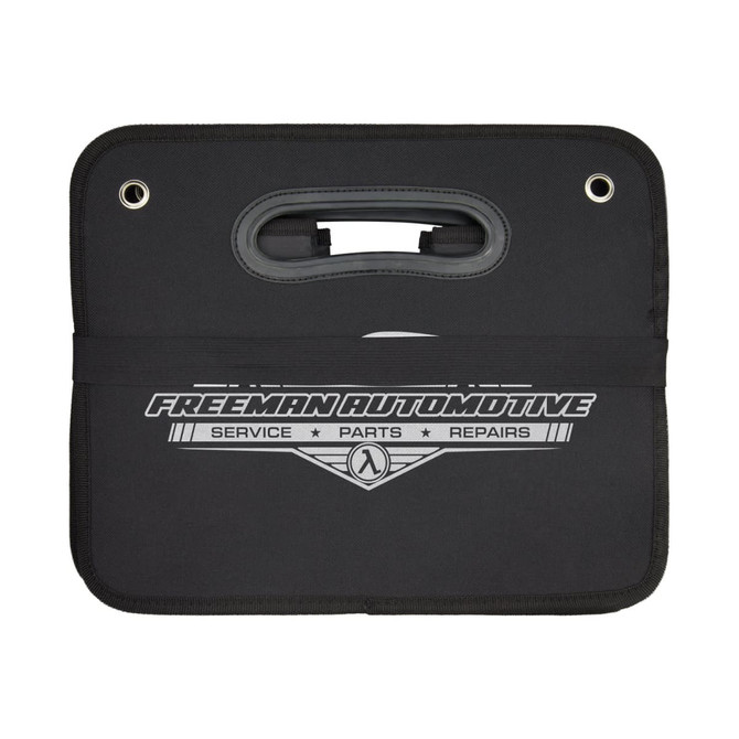 A black cargo storage organiser with a handle and a logo. Features a zippered compartment for miscellaneous items.