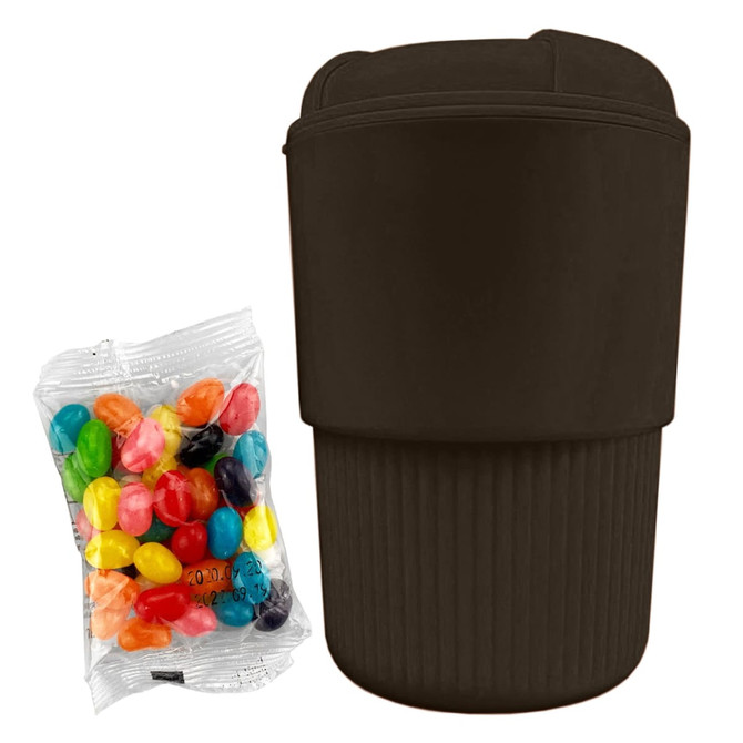 A reusable coffee cup in dark brown, next to a pack of colourful jelly beans. It features a branding logo.