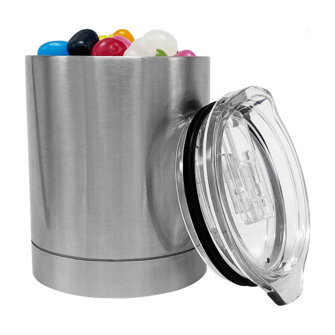 A stainless steel coffee mug with a clear lid, filled with colourful jelly beans.