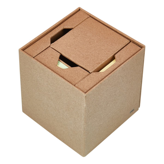 A cube-shaped brown memo holder with sticky notes inside, featuring a simple design and a branding logo.