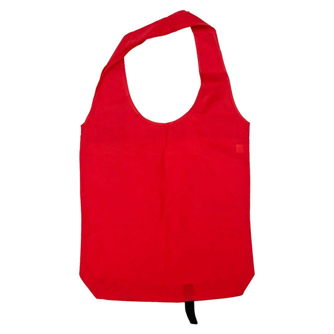 A red tote bag with long handles and a single compartment, featuring a logo.