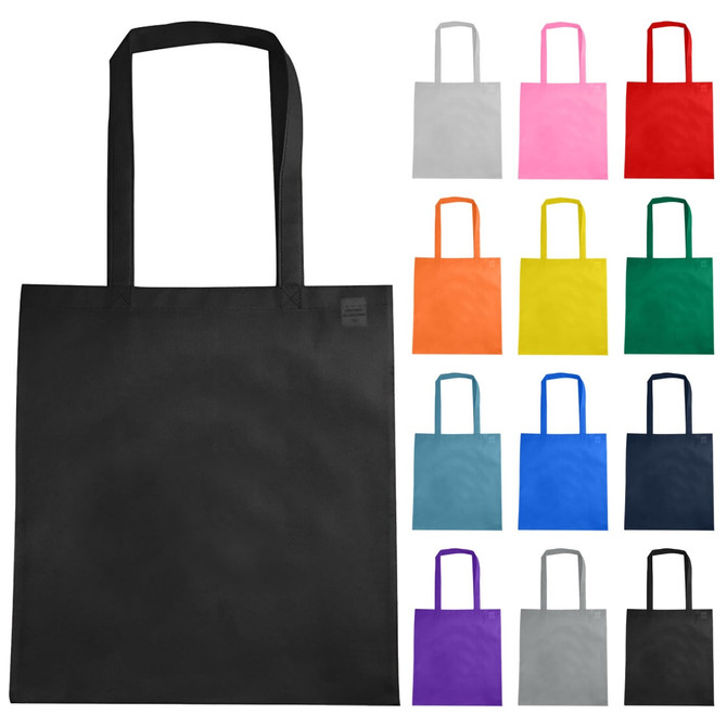 A black non-woven reusable grocery bag with long handles, surrounded by bags in various colours including grey, pink, red, and blue.