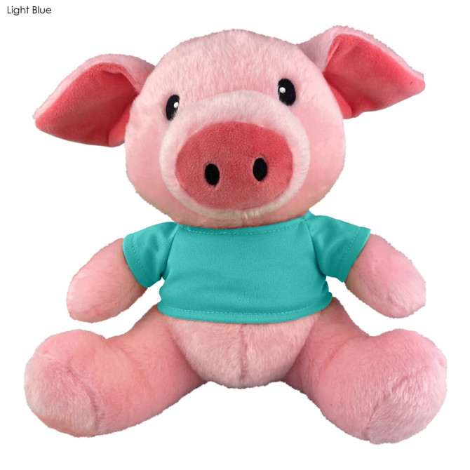 A pink pig plush toy wearing a light blue shirt, featuring big ears and a friendly face. It has a branded tag.