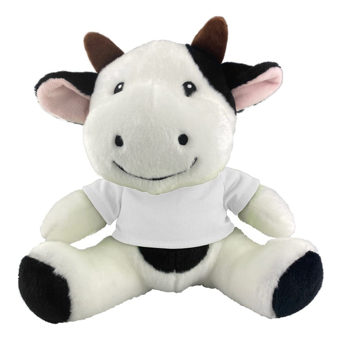 A plush cow toy featuring black and white fur, with a smiling face and a white shirt. It has a soft, cuddly appearance.