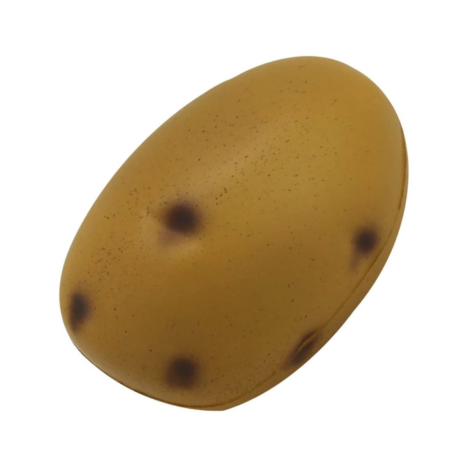 A light brown stress relief toy shaped like a potato, featuring dark spots for added realism.