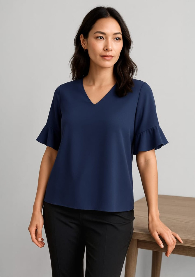 A navy fluted sleeve blouse with a V-neck design, featuring stylish ruffled sleeves. Includes a logo.