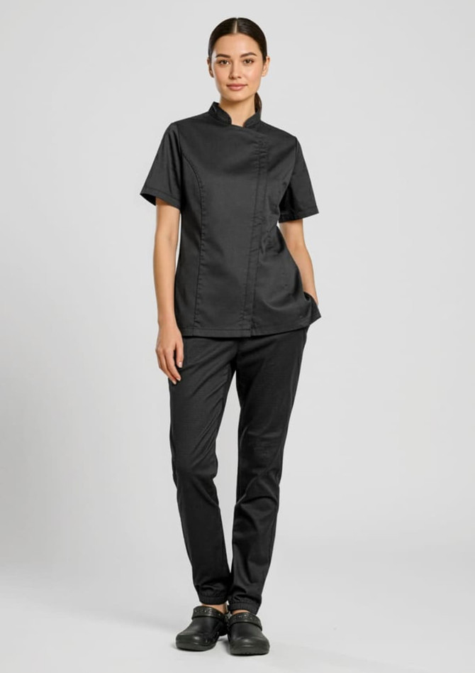 A black short sleeve chef jacket paired with matching black trousers, featuring a stylish design and a logo.