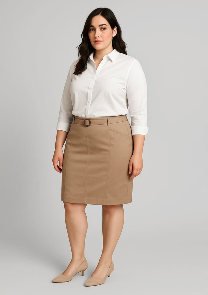 A mid-waist stretch chino skirt in a light brown colour, paired with a white button-up shirt.