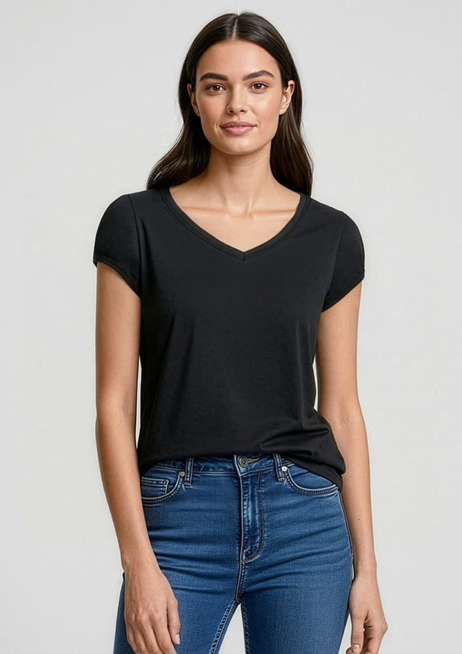 A black short sleeve women's tee with a V-neck design, styled with fitted jeans. It features a logo.
