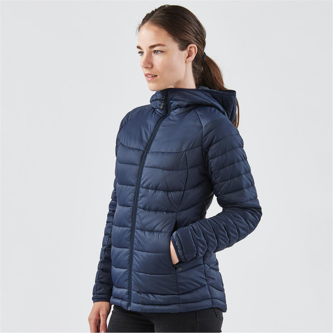 A women's thermal jacket in navy blue with a zip front, hood, and side pockets, featuring a logo.