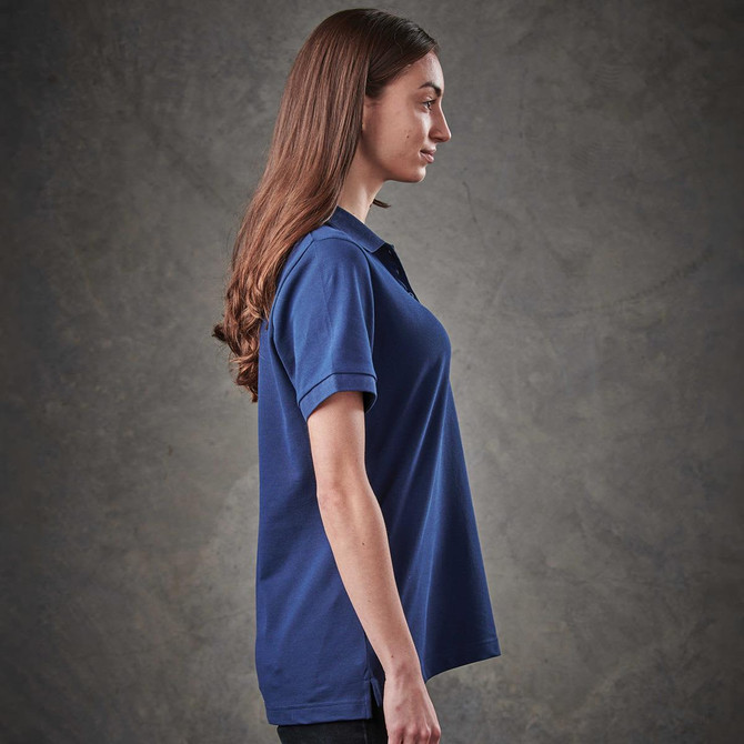 A women's navy polo shirt with a classic fit and short sleeves. Features a logo on the chest.