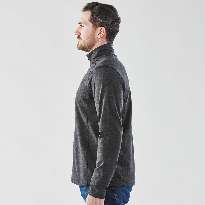 A grey men's 1/4 zip pullover jumper displayed on a model from the side, featuring a subtle branding element.