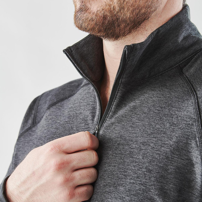 A men's quarter-zip pullover in grey, featuring a collar and a zip closure, with a branding logo.