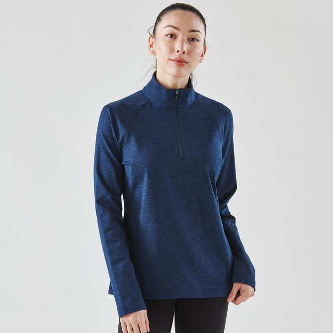 A navy blue 1/4 zip pullover jumper for women with a stand-up collar and long sleeves. It features branding.
