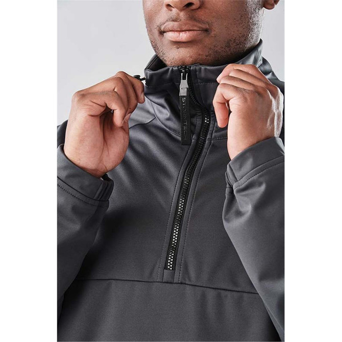 A grey Men's Catskill Anorak jacket being worn, with the wearer adjusting the zip at the collar.