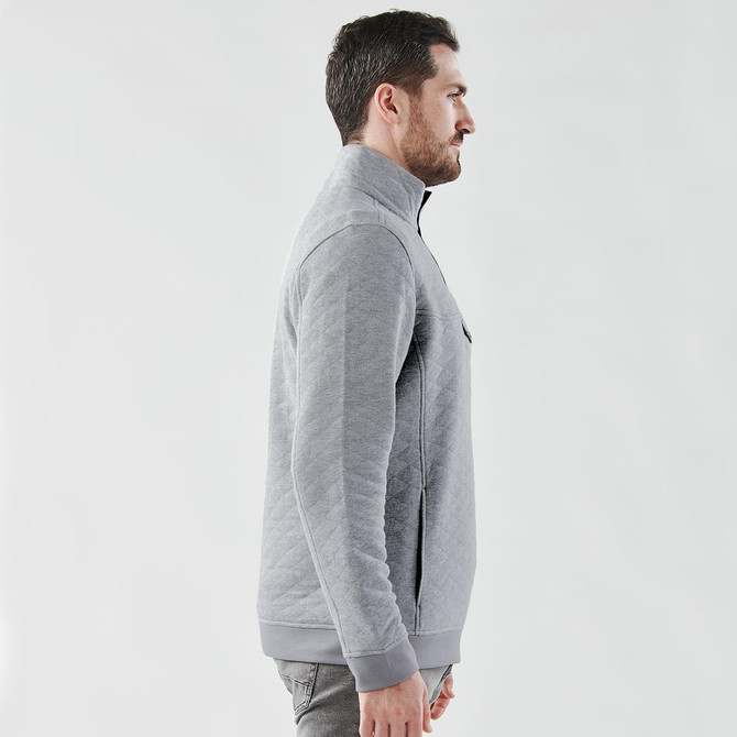 A grey men's thermal 1/4 zip pullover, featuring a simple design and a side view. It has a logo on it.