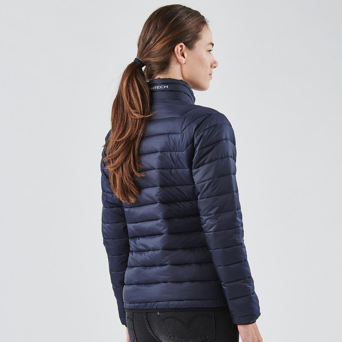 A women's jacket in navy blue with a quilted design and a collar, featuring a logo at the back.