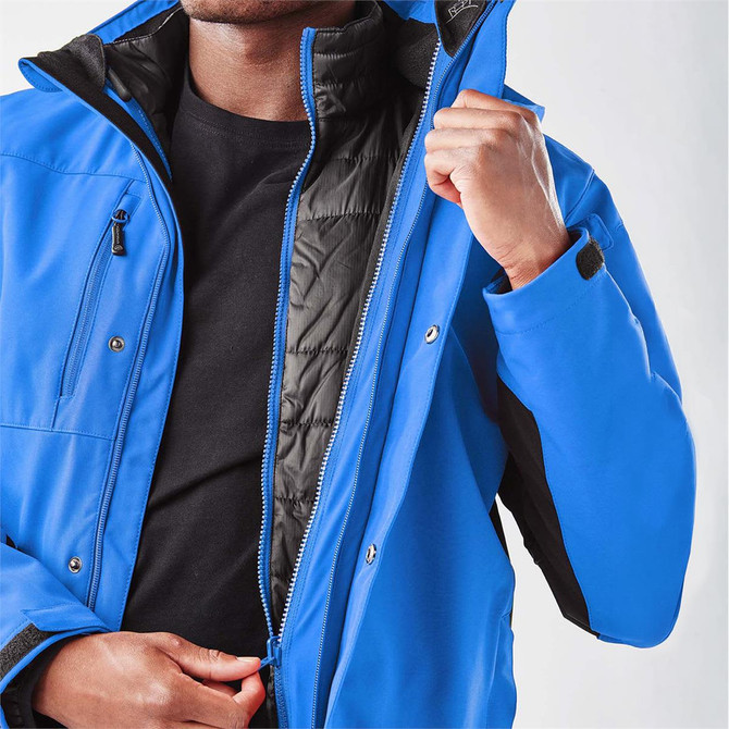 A blue men's jacket with a zippered front and a black inner lining, featuring a logo.