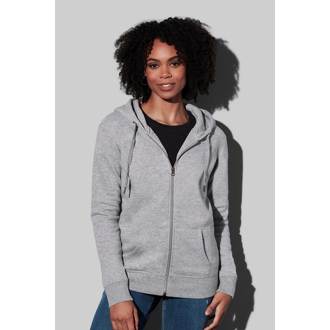 A women's active sweatjacket in grey, featuring a zip front, hood, and pockets, with a model wearing it.