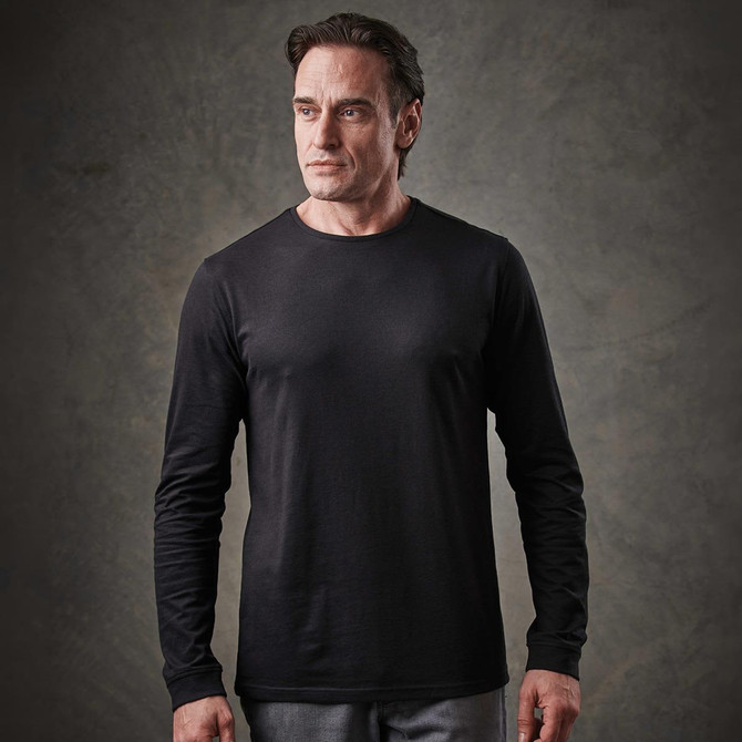 A black long-sleeve T-shirt displayed on a model, featuring a fitted design and a round neckline.